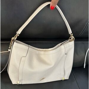 Off white authentic coach leather shoulder bag.
